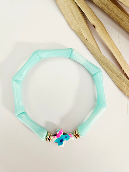 ALMA | Croix turquoise rosée