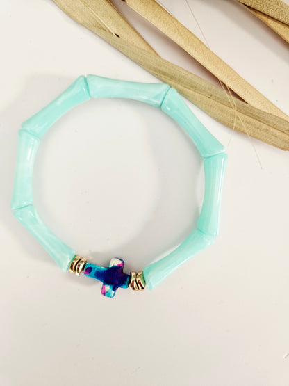 ALMA | Croix turquoise rosée